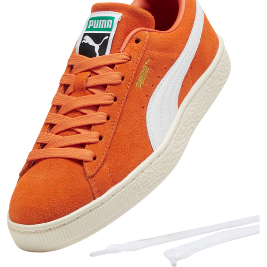 Brown and orange puma shoes top