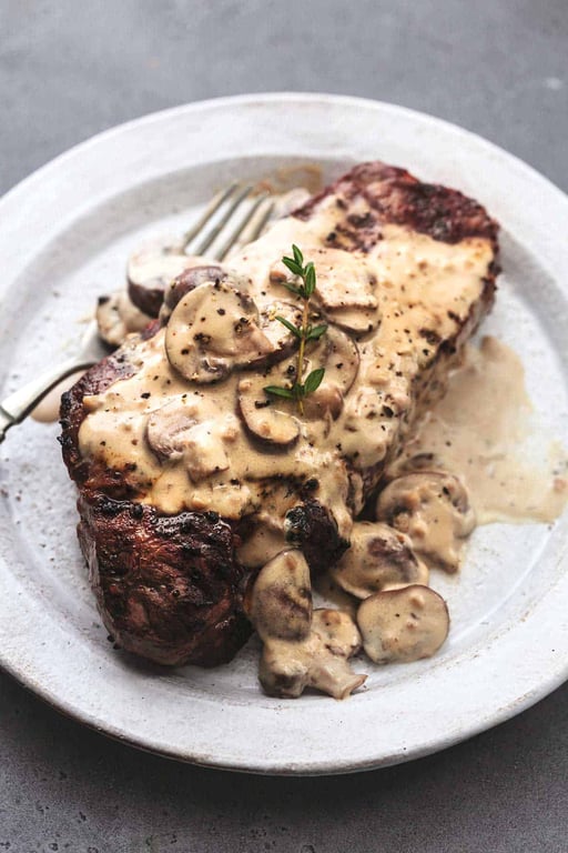 Grilled Flank steak with creamy mushroom sauce