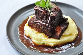 Port braised short ribs with kale and pomme puree