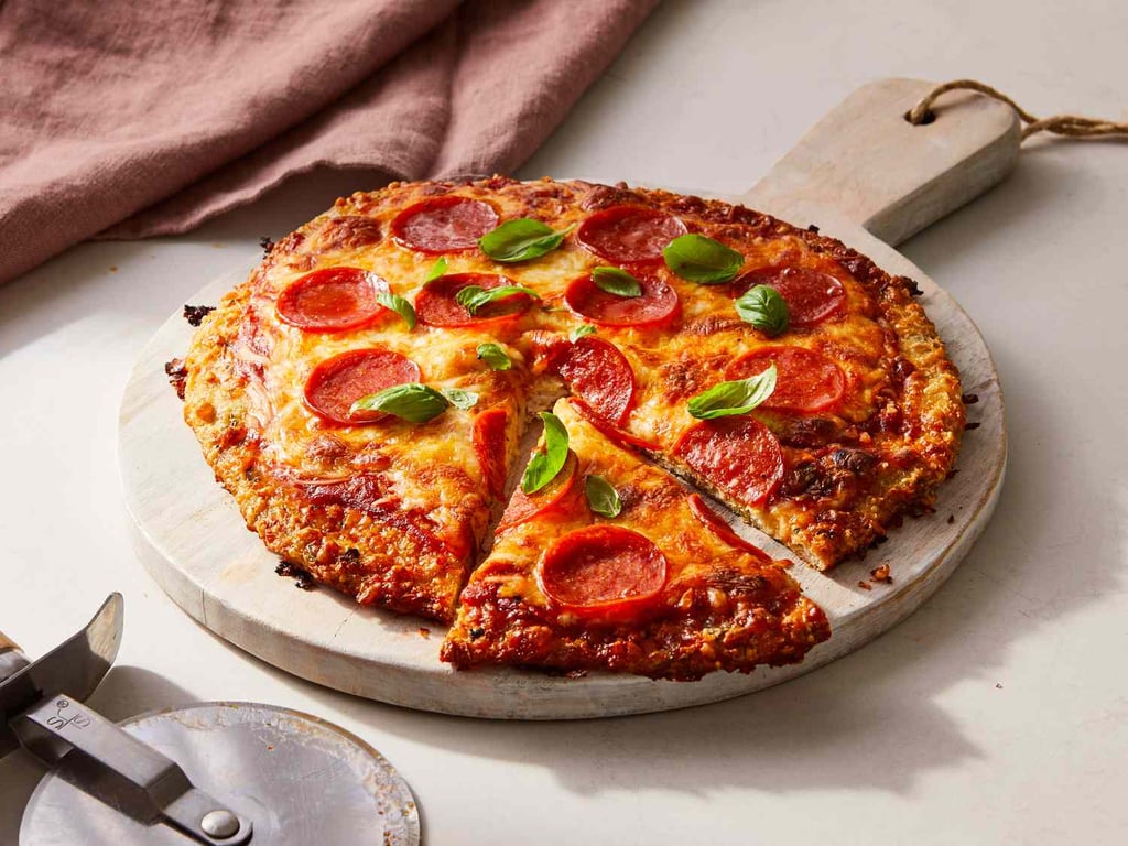 Gluten free ground chicken base pizza