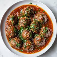 Beef Kefta in N African spiced tomato sauce
