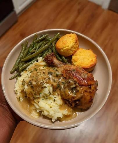 smothered chicken with gravy and mashed potatoes
