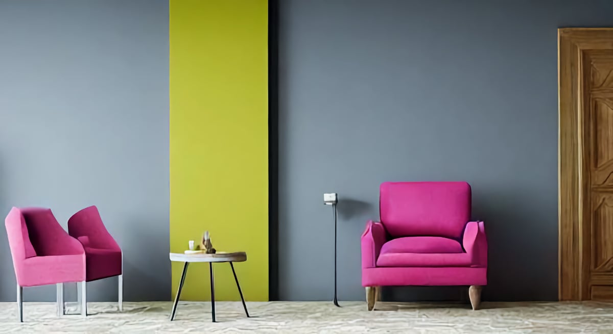 colorful armchair on gray walls