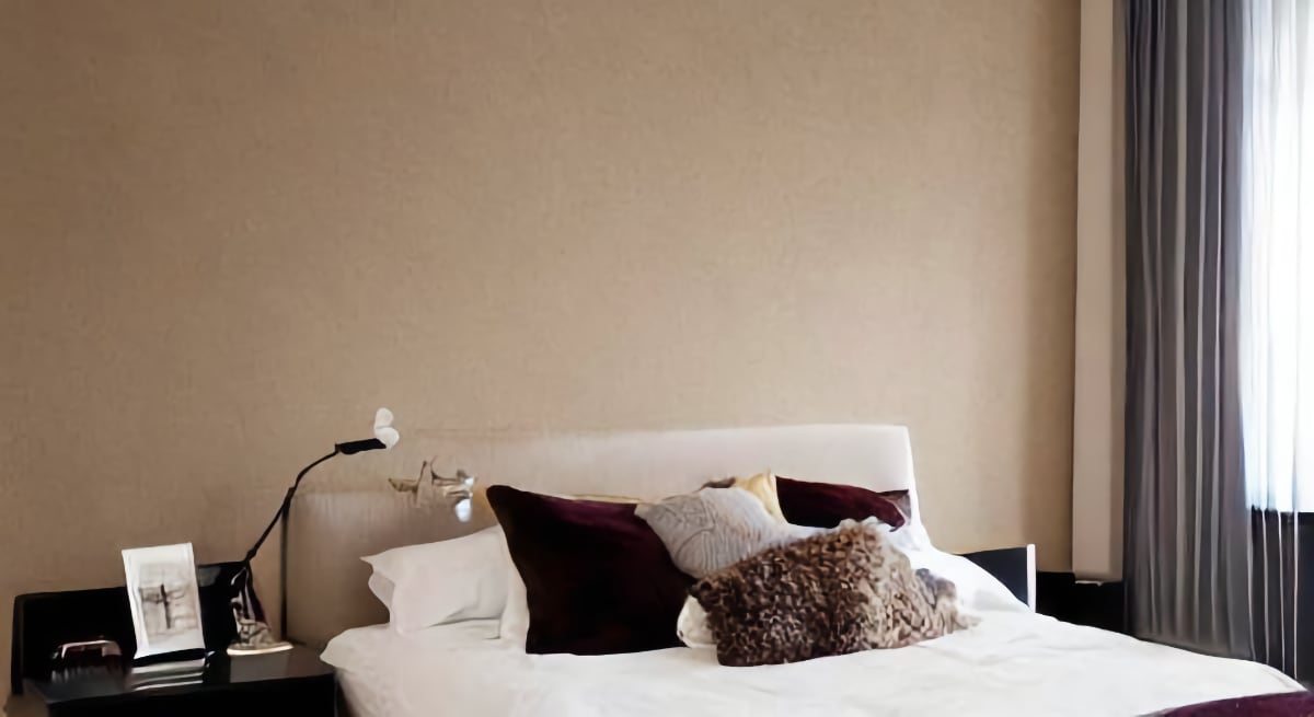 Bedrooms with beige walls