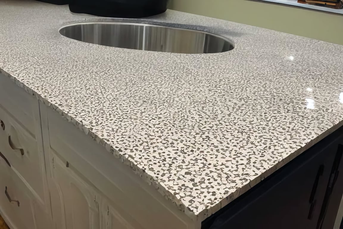 How do you prepare the surface for tiling?