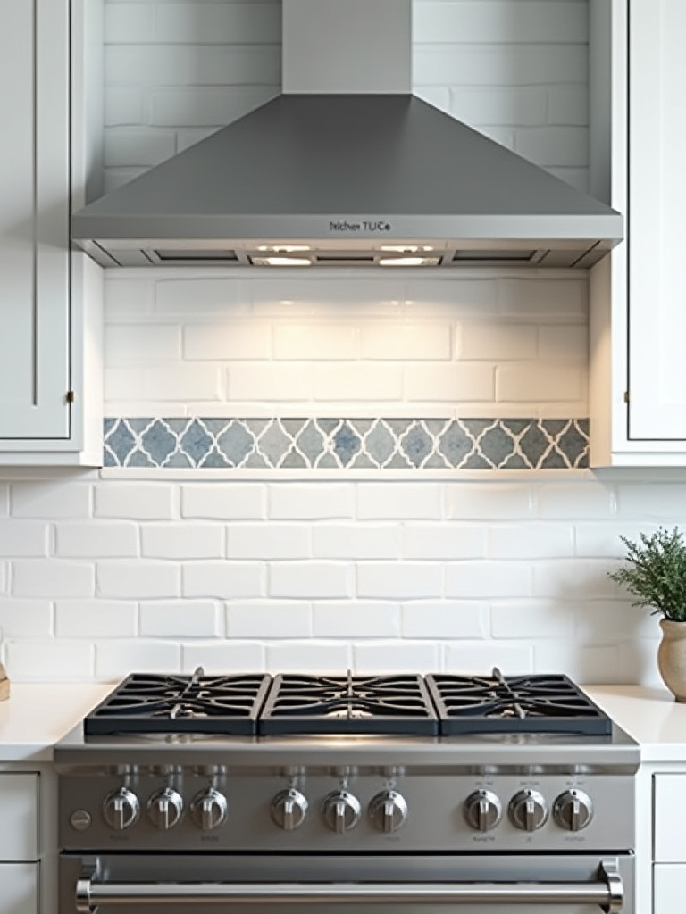 Close-up of a kitchen backsplash featuring intricate blue and white geometric accent tiles creating a striking focal point above a modern range.