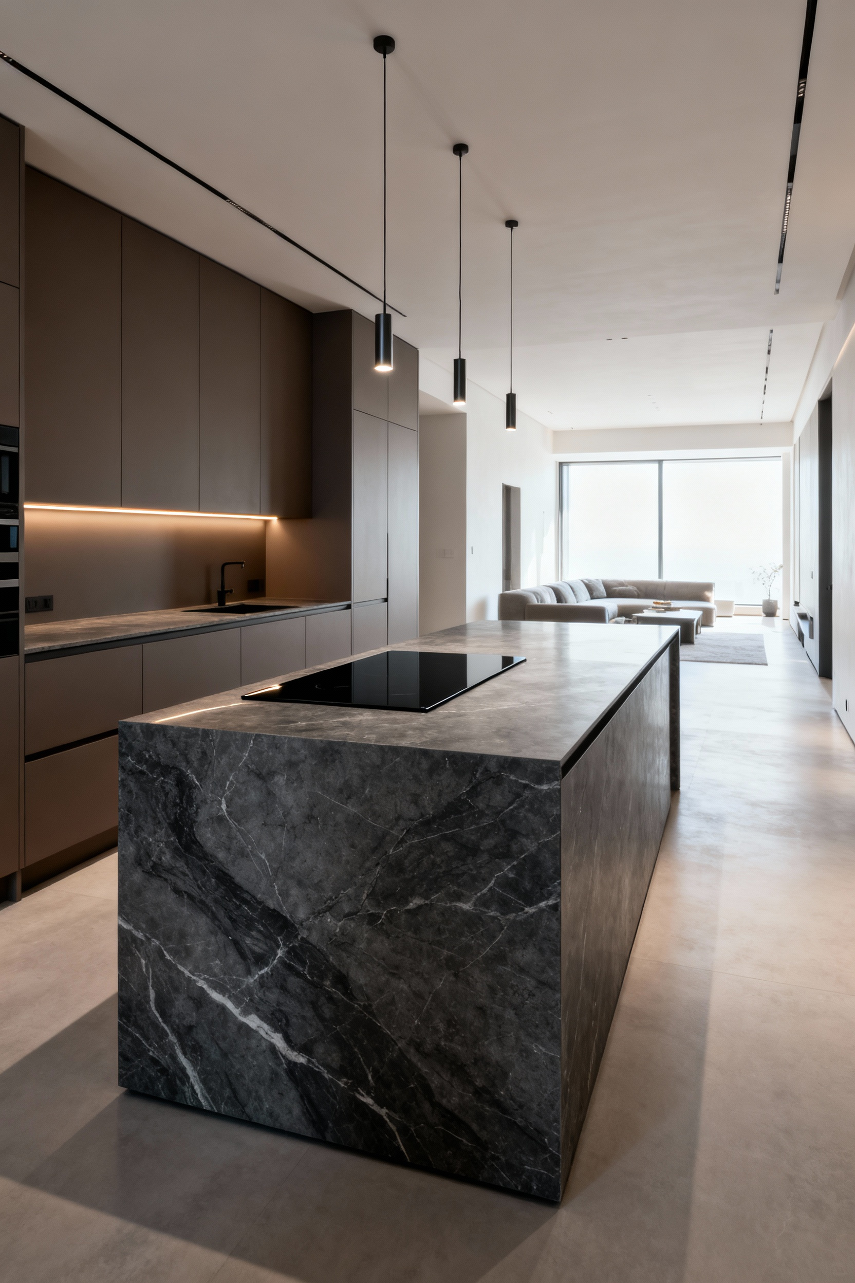 Contemporary open-concept kitchen featuring dark matte flat-panel cabinets, a large central island with an integrated cooktop, and wide aisles designed for task-based work zone calibration.
