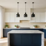 A kitchen that brings together the most impactful kitchen decoration ideas — statement backsplash, two-tone cabinet paint, pendant lighting, and a styled island — showing how structural decisions and fine details work together.