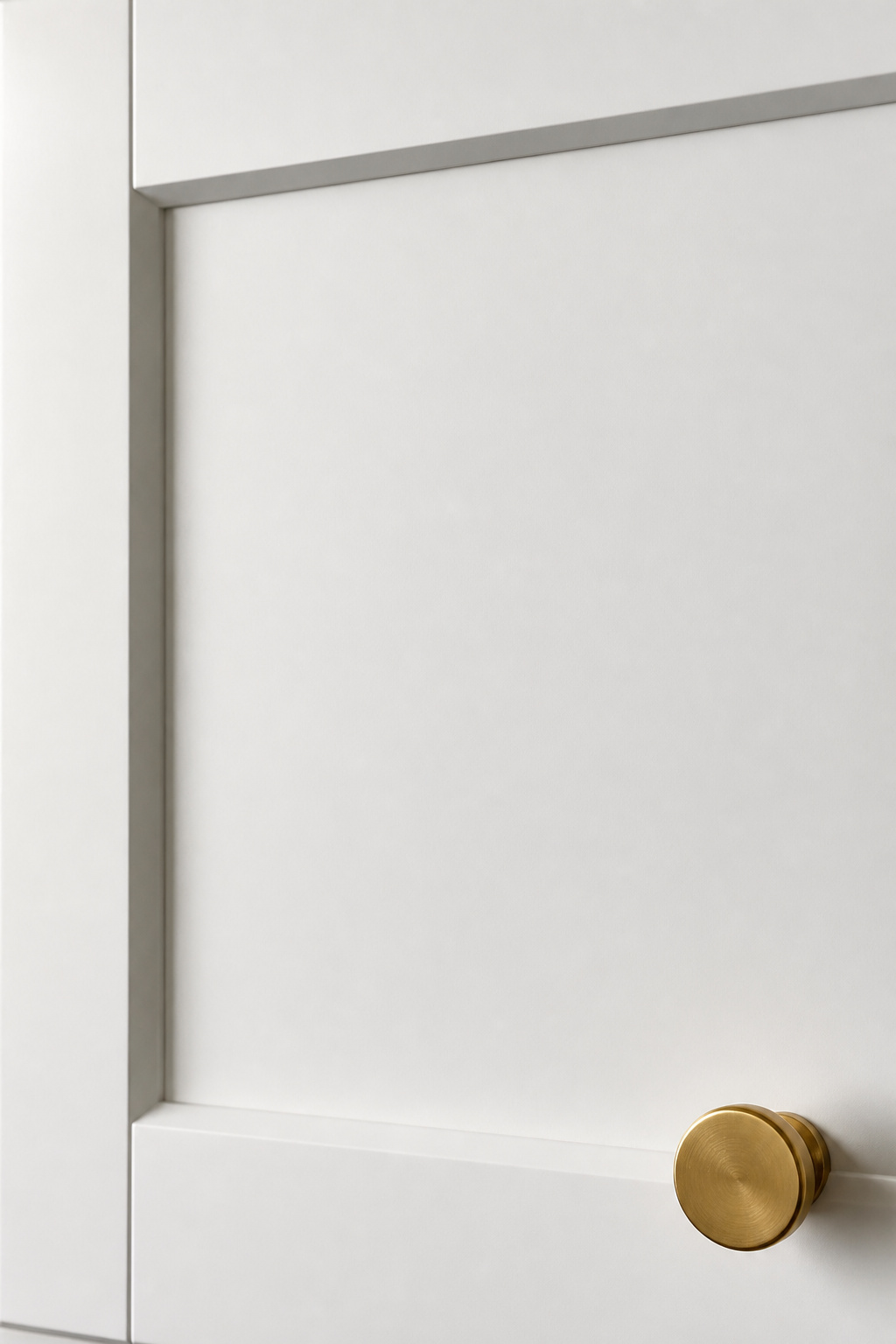 Factory-lacquered white cabinet door showing the smooth, uniform surface finish that a controlled application environment achieves — the standard site painting can't reliably replicate.