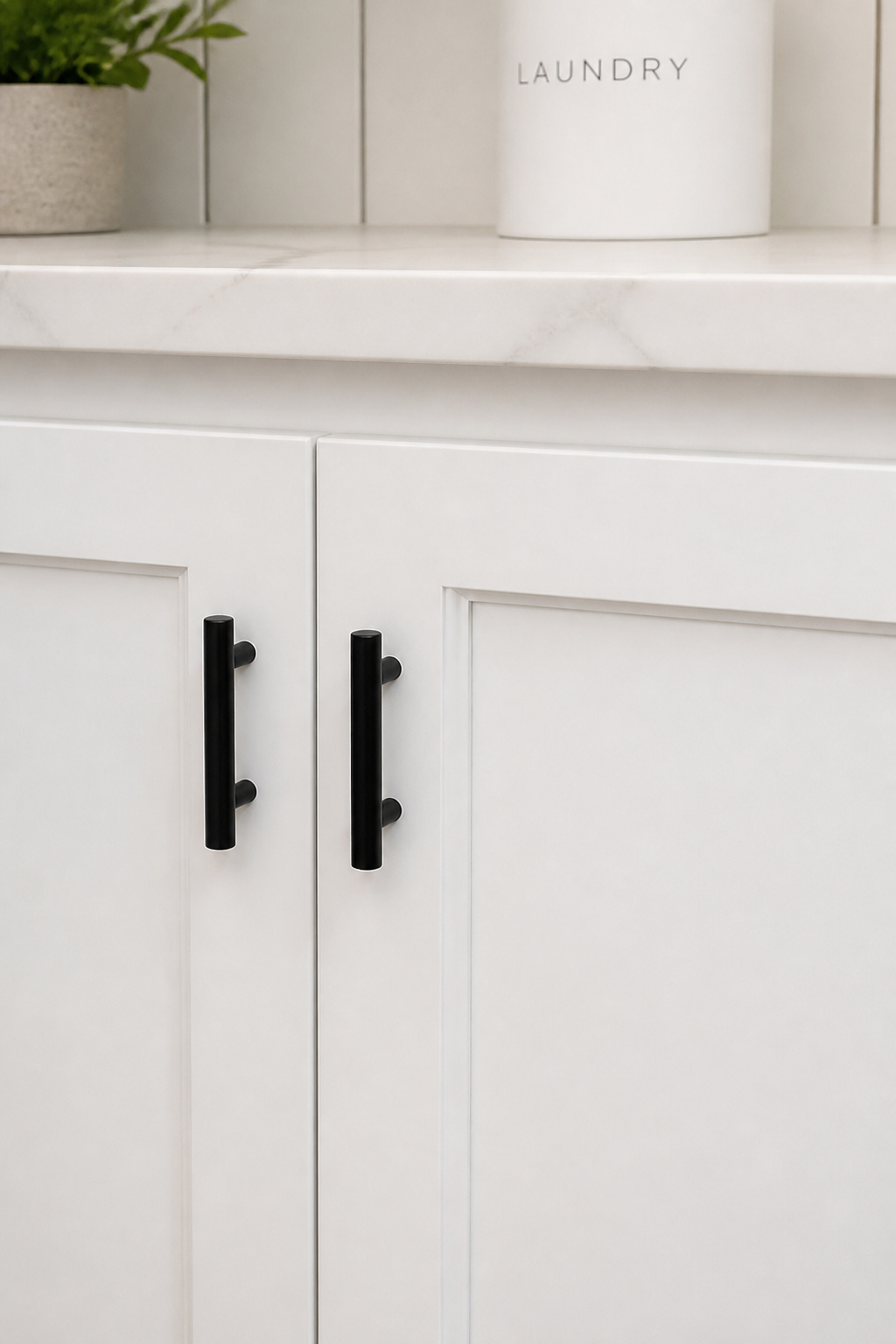 Matte black bar pulls — a $25 set from Amazon or IKEA — take under an hour to install and immediately make even basic cabinet doors look intentionally designed.