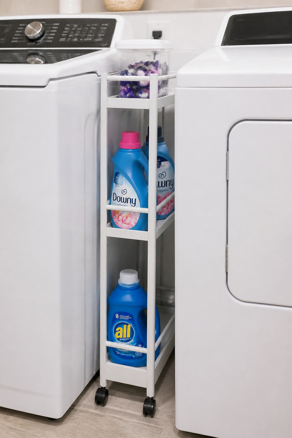 A slim rolling cart fits the gap between appliances and adds three shelves of laundry room storage without any installation.
