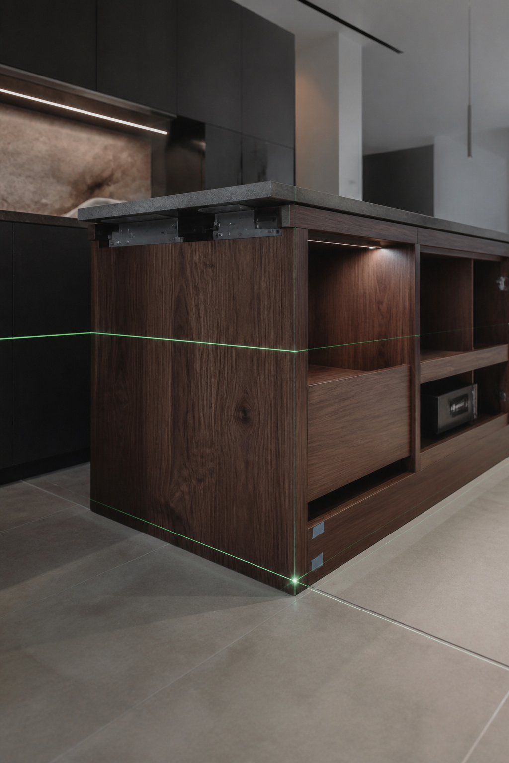 Detailed view of a luxurious wood kitchen island being precisely installed, highlighting a concealed structural connection and laser-guided alignment, showcasing initial flawless on-site integration.