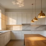 A warm British kitchen interior with a cluster of brass pendants as kitchen lighting over table, casting an intimate pool of light above the oak dining surface.