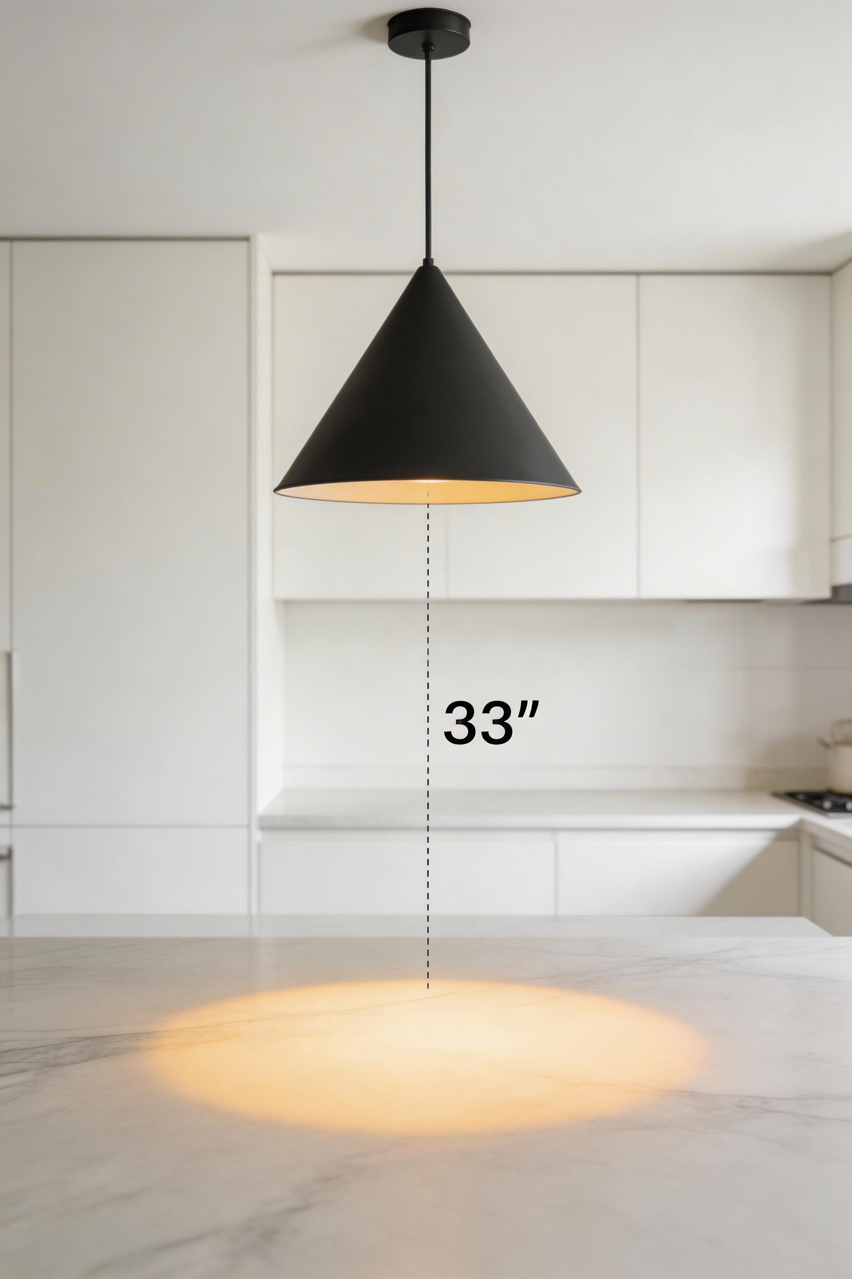 The correct hanging height for kitchen lighting over table: 30-34 inches from pendant base to table surface, delivering an intimate pool of light without intruding on seated sightlines.