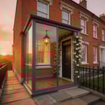 A complete porch remodel on a Victorian terrace: glazed panels, heritage lantern, period railings and star jasmine combine to transform an unremarkable entrance into a considered arrival.