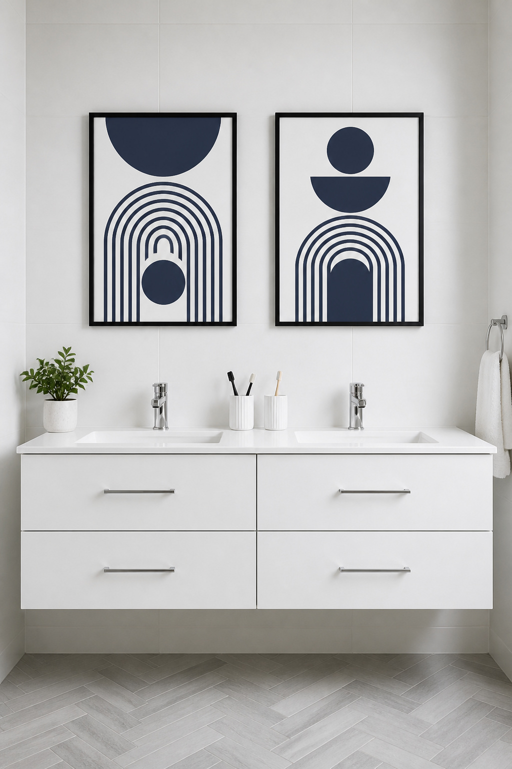 A matched pair of bold geometric prints above a double vanity adds graphic confidence to a minimalist bathroom without disrupting its calm.