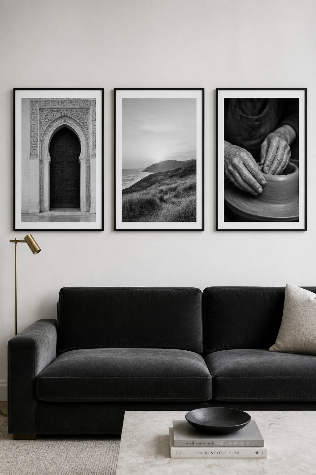Three large black-and-white photographs in float frames bring gallery-quality presence to a contemporary living room. Monochrome art is colourless and therefore universally compatible with any room palette.