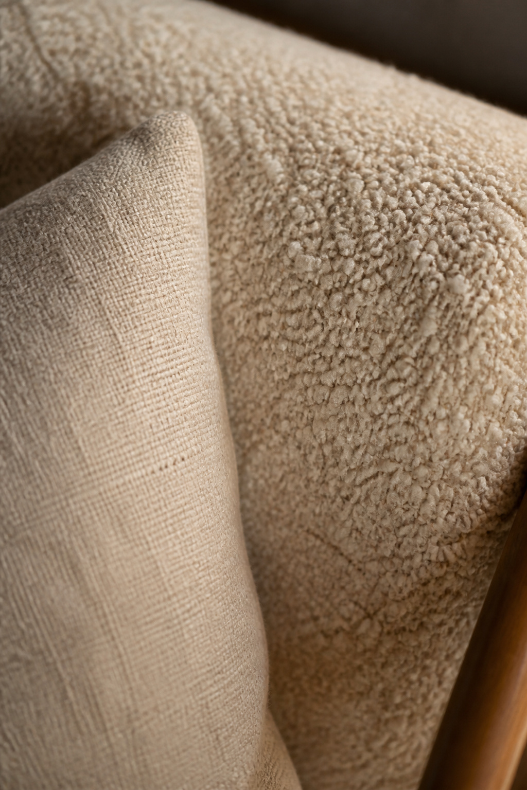 Boucle's looped yarn structure traps air and warmth — and at 50,000+ rub count in quality versions, it's more durable than it looks.