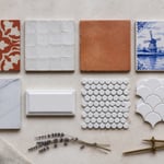 Eight tile materials spanning from 10th-century Moroccan zellige to contemporary rectified porcelain — the range covered in this guide, each with its own rules for selection, installation, and maintenance.