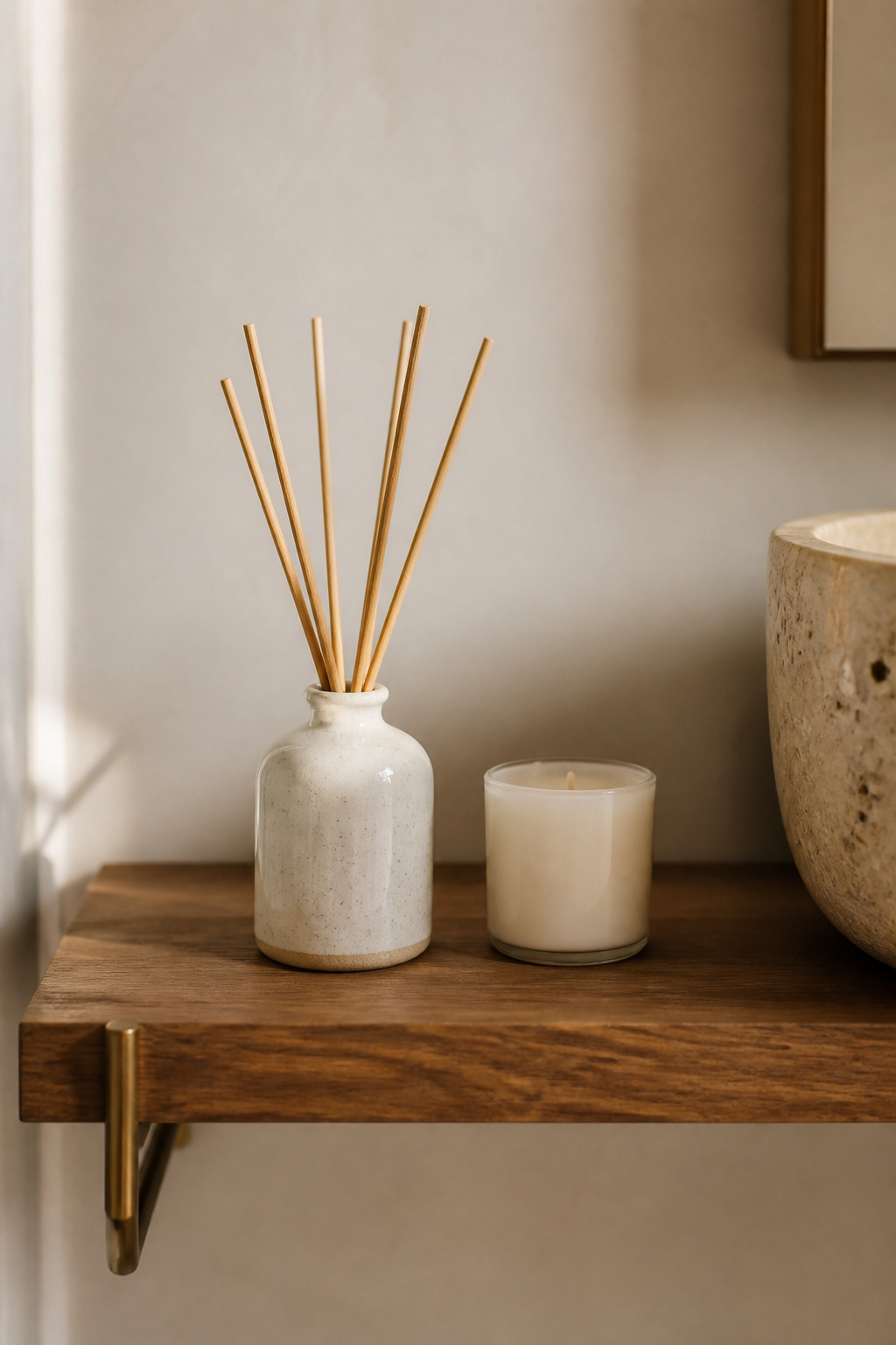 A phthalate-free reed diffuser in lavender or eucalyptus delivers continuous background scent without flame or electricity — the simplest sensory layer to add to a small bathroom's wellness palette.