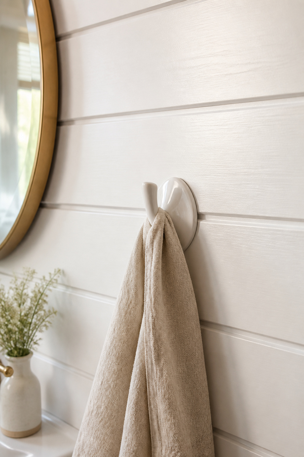 White PVC shiplap gives a beach bathroom its most authentic coastal signal without a single tile change.