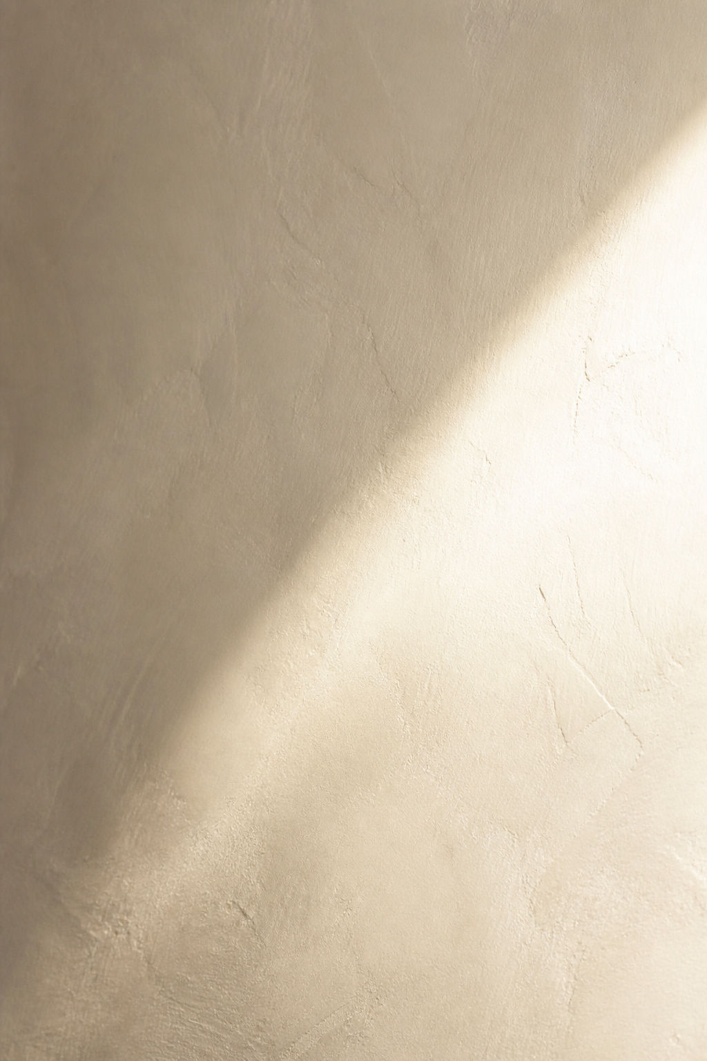 Limewash white walls — the finish that gives an all-white bedroom a sense of depth and life rather than blankness.