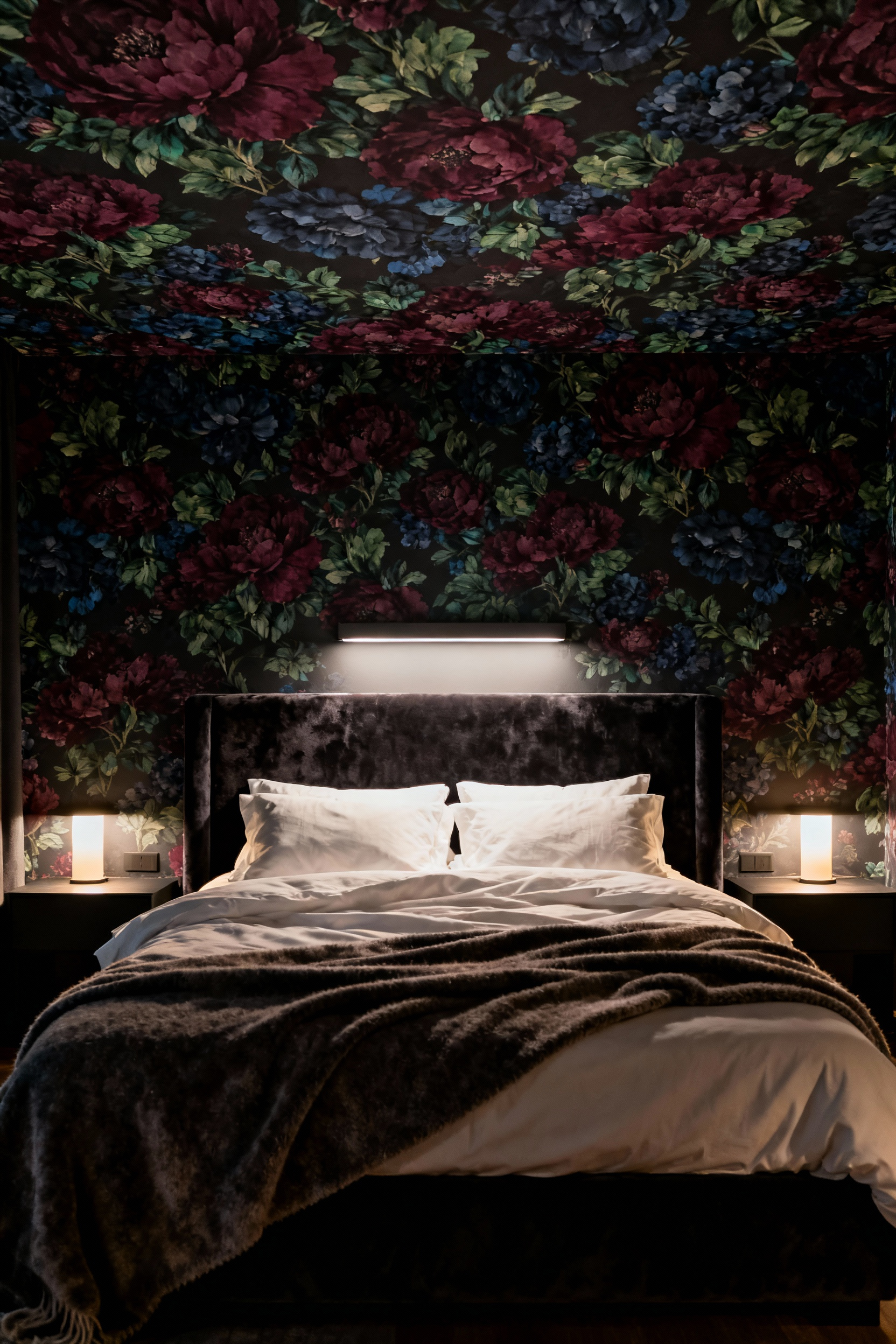 Master bedroom featuring a deep, dramatic moody floral wallpaper covering the entire ceiling, creating an intimate, cocoon-like atmosphere above the king-sized bed.