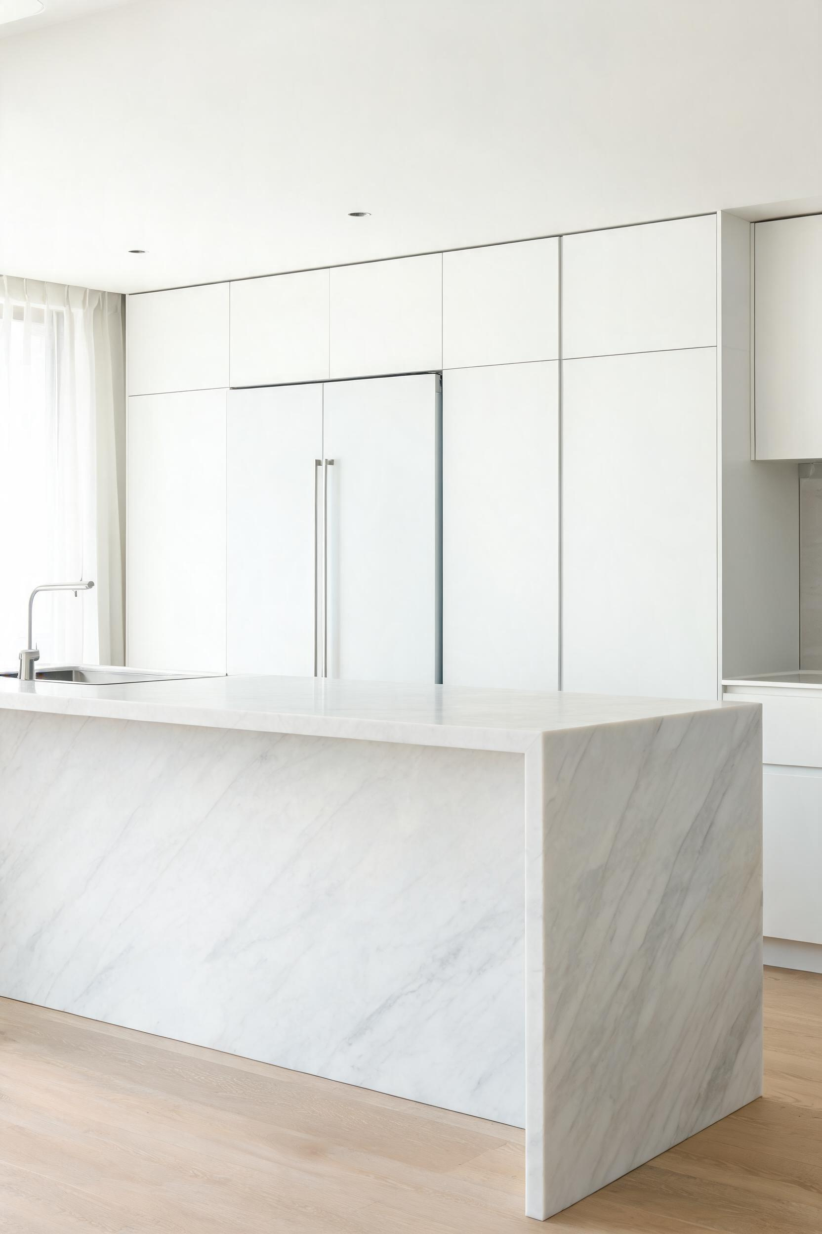 Panel-ready integrated appliances create a seamless cabinet wall that reads as furniture rather than equipment — a transformation that changes how the whole room feels.