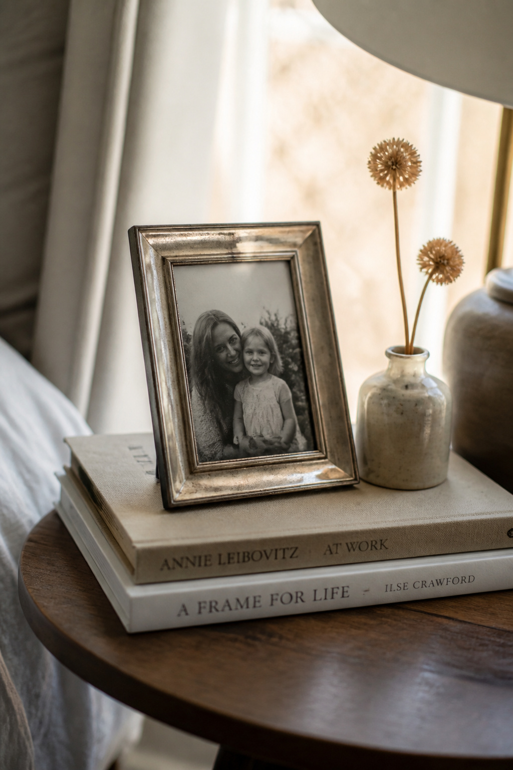 A small leaning frame with a personal photograph is the fastest way to make styled end table decor feel like it belongs to you.