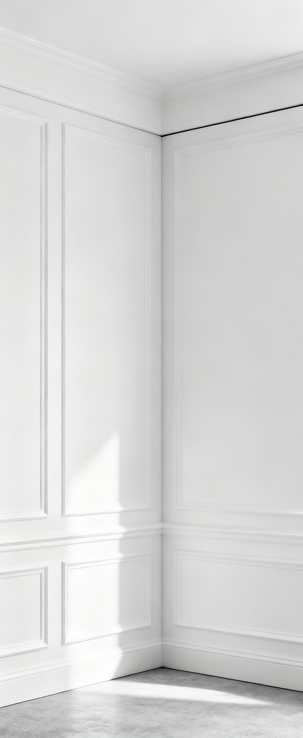 Close-up of perfectly joined white architectural wall panels in a minimalist bedroom, demonstrating seamless integration and elegant Articulated Joinery under soft, ambient light.