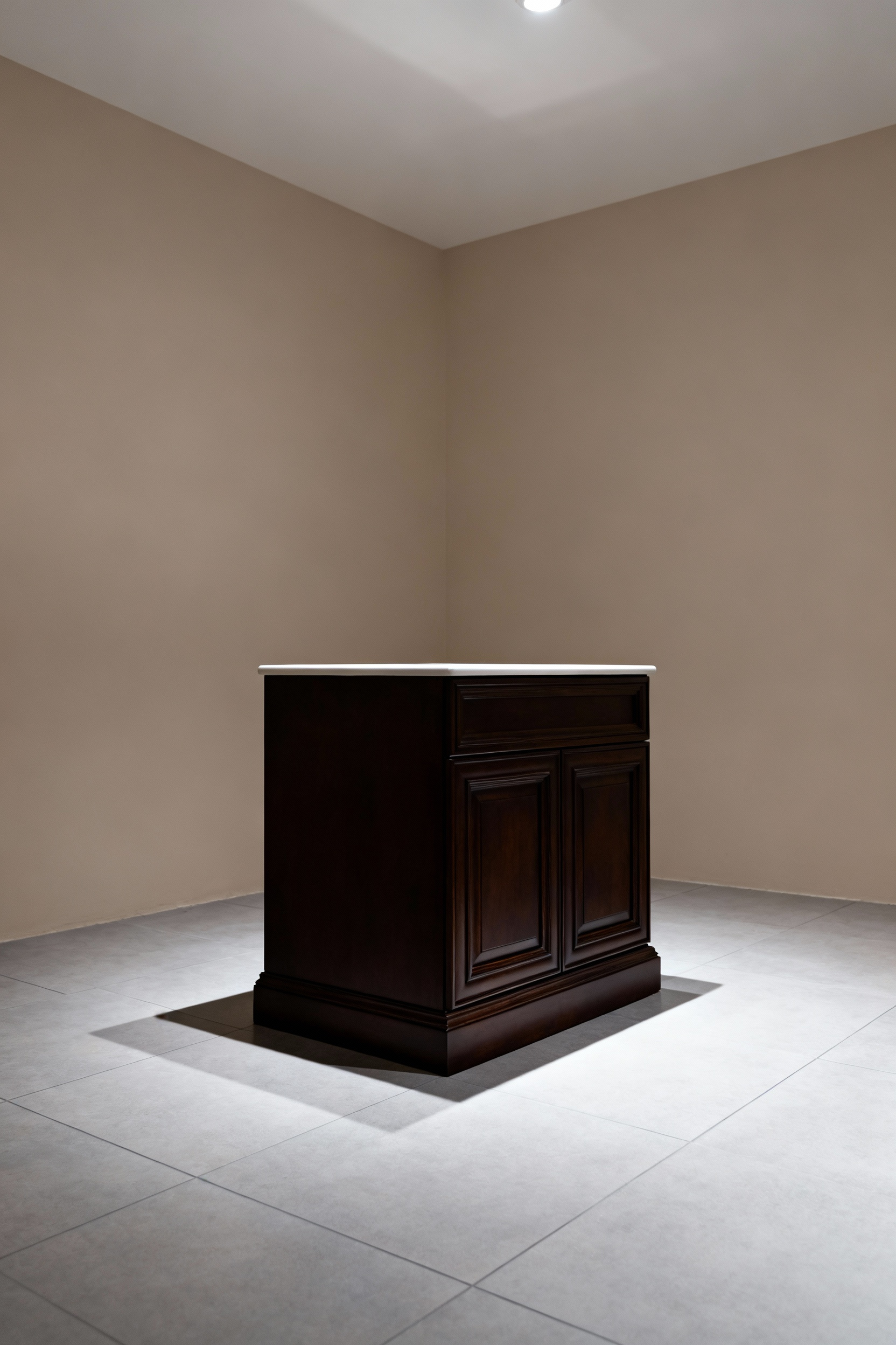 A small, cramped bathroom featuring a dark, traditional box-style vanity that rests flush on the floor, demonstrating high visual weight and interrupting the floor plane.