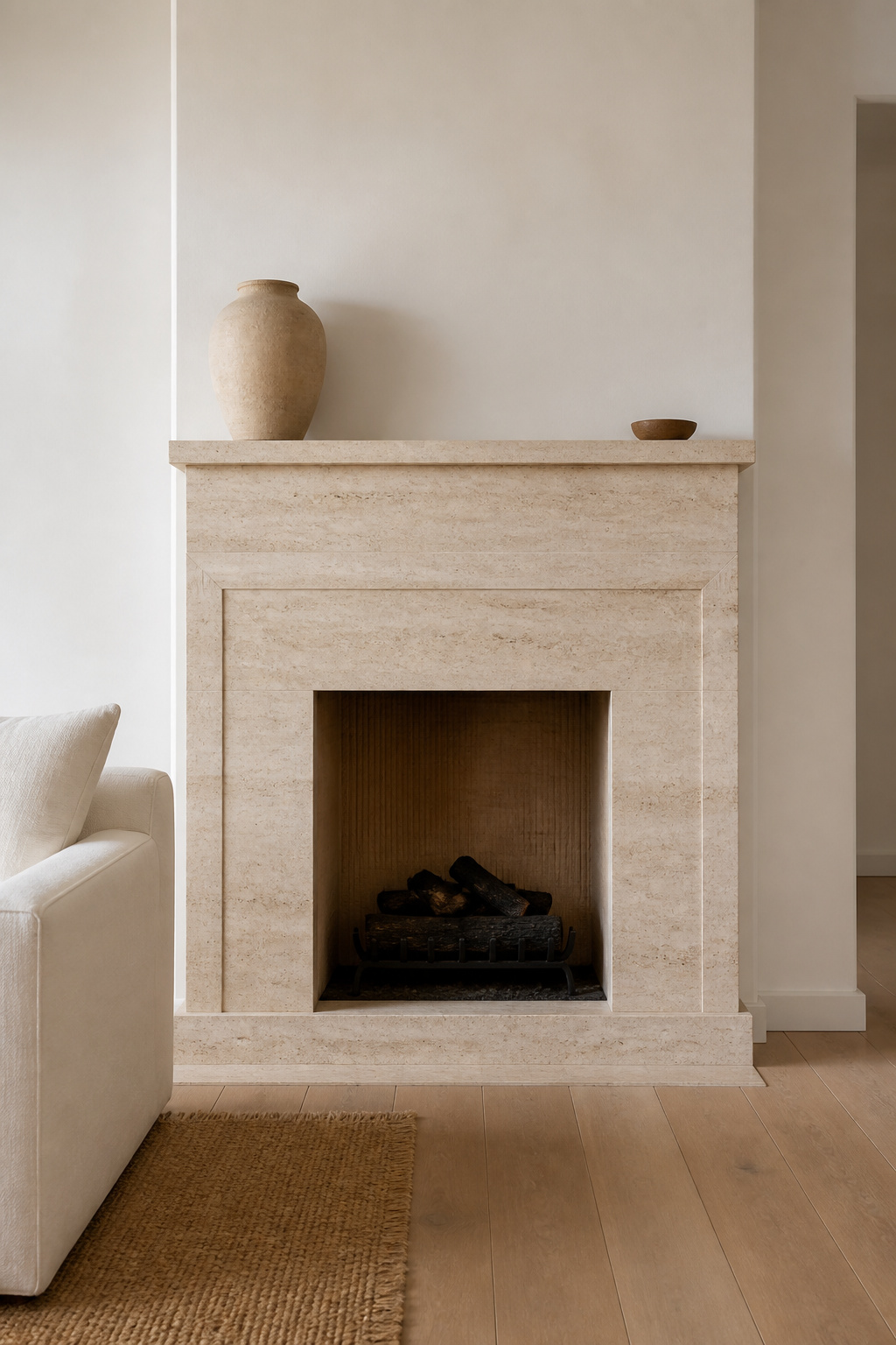 Honed travertine in natural light: the matte finish absorbs rather than reflects, making the stone read warmer and more architectural than polished alternatives.