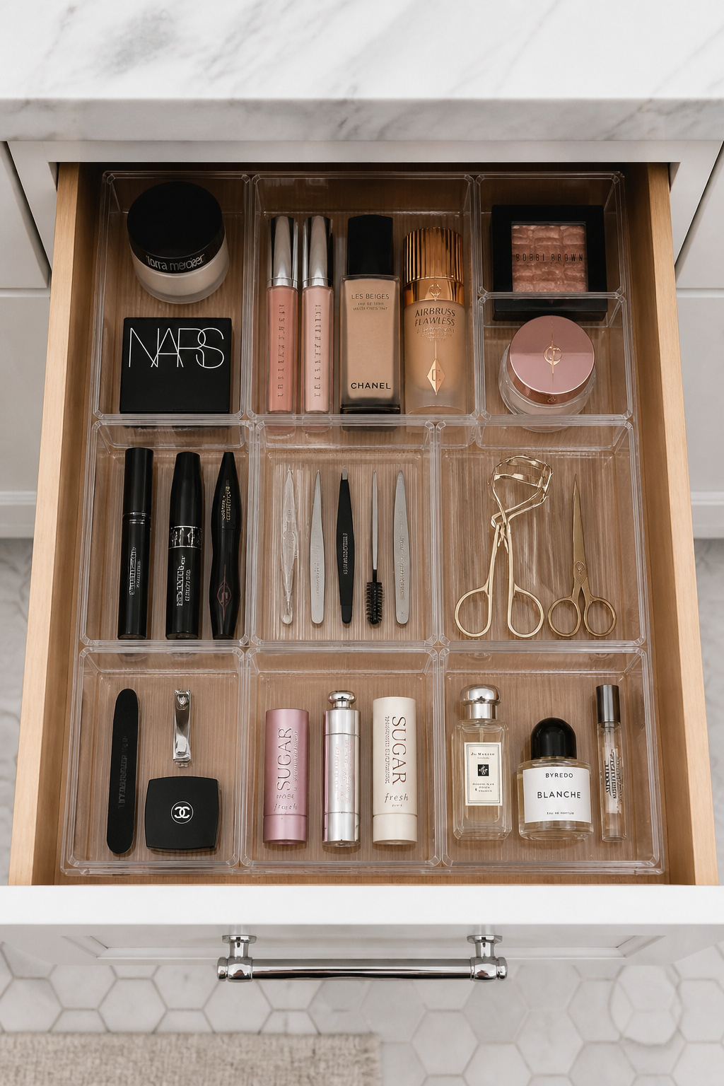 Drawer dividers solve the fundamental small bathroom storage problem inside cabinets — making everything visible at once so nothing gets buried, bought twice, or lost under a pile of hair ties.