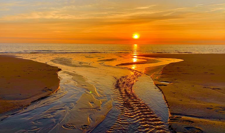 Zonsondergang op het strand