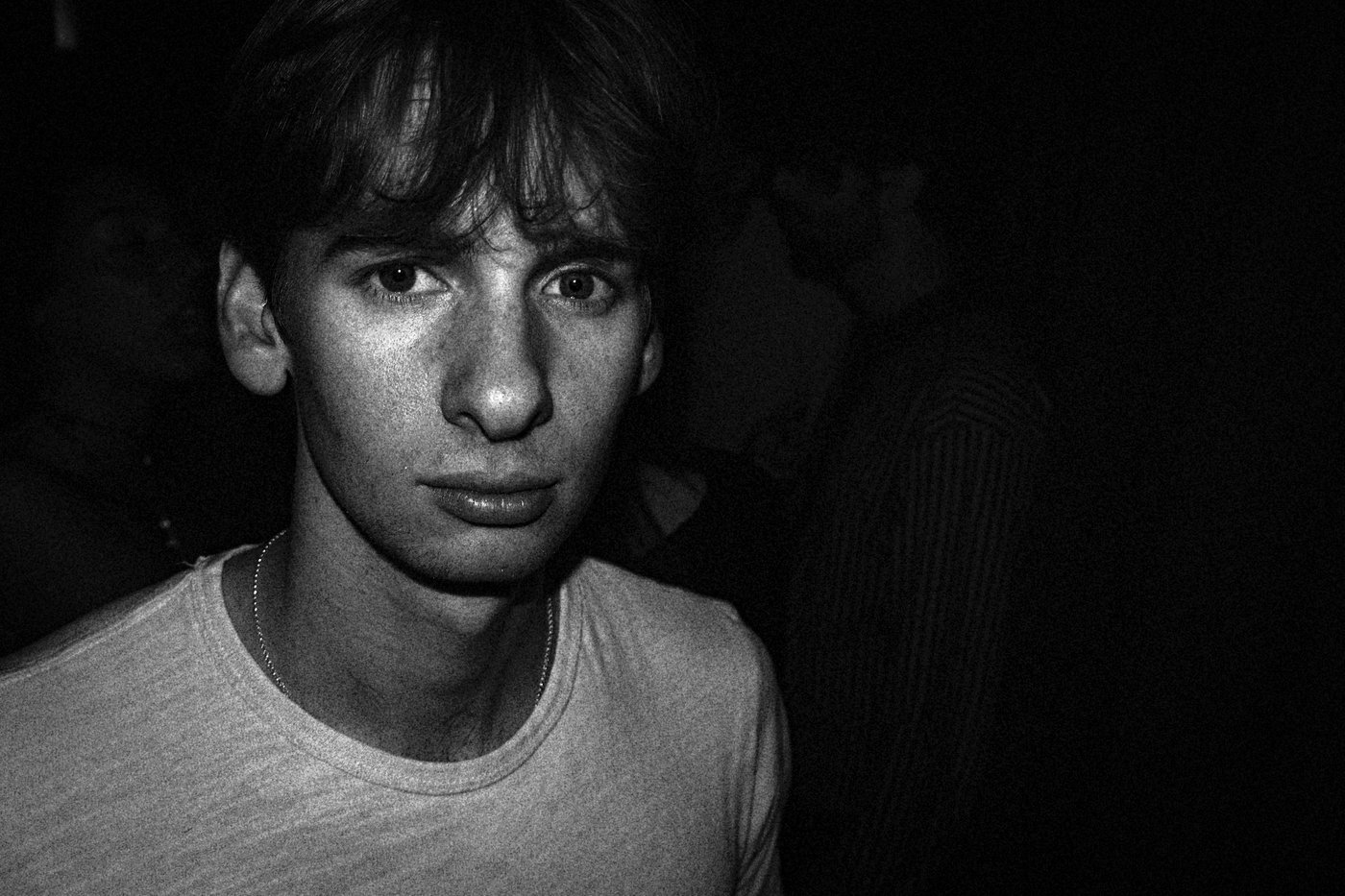 a man with a white t-shirt