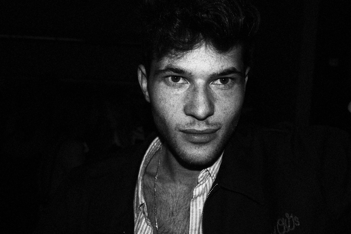 Man in Stripped Shirt