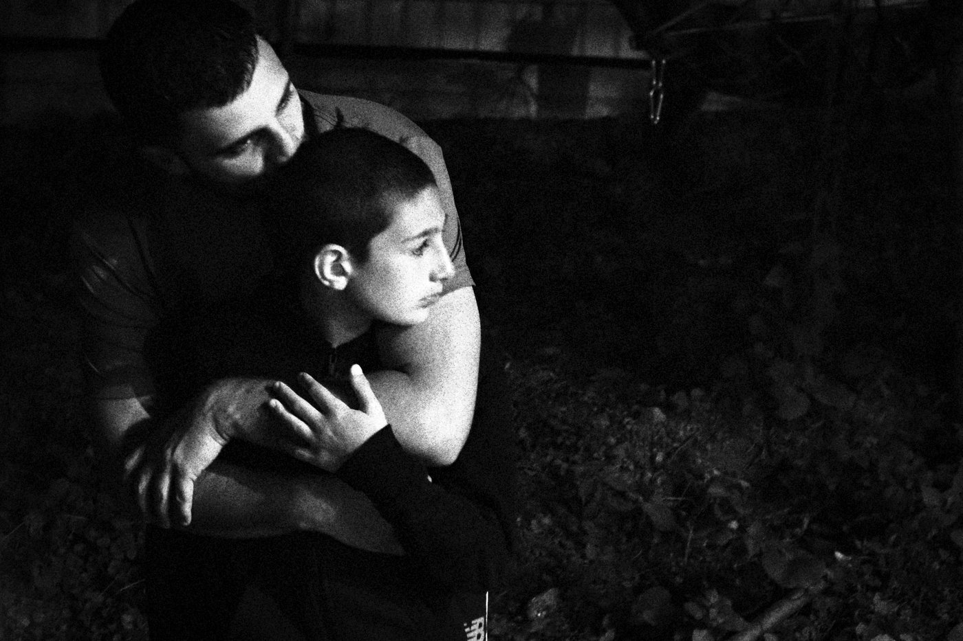 Father embracing his son in Georgia