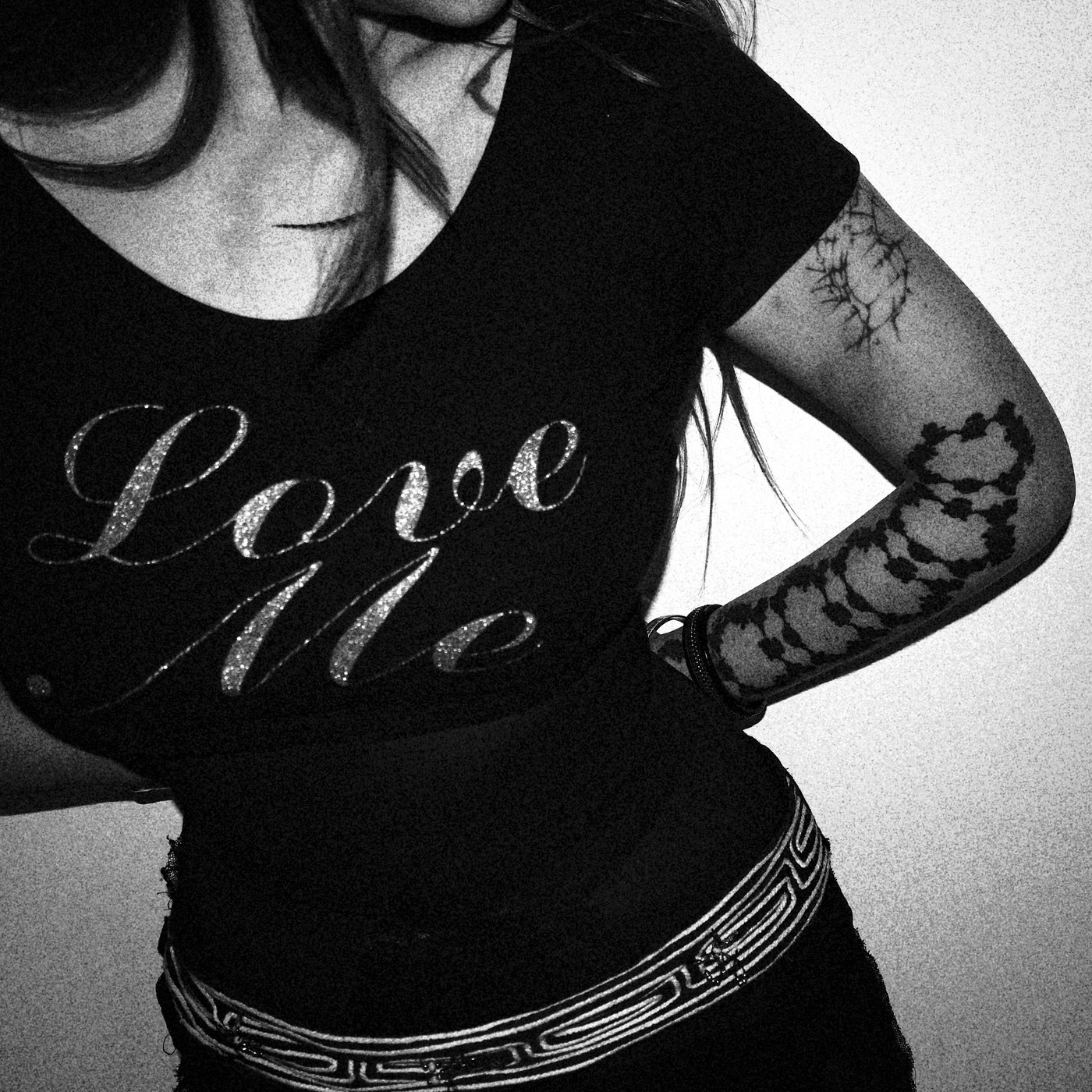 a woman with a t-shitrt that says love me