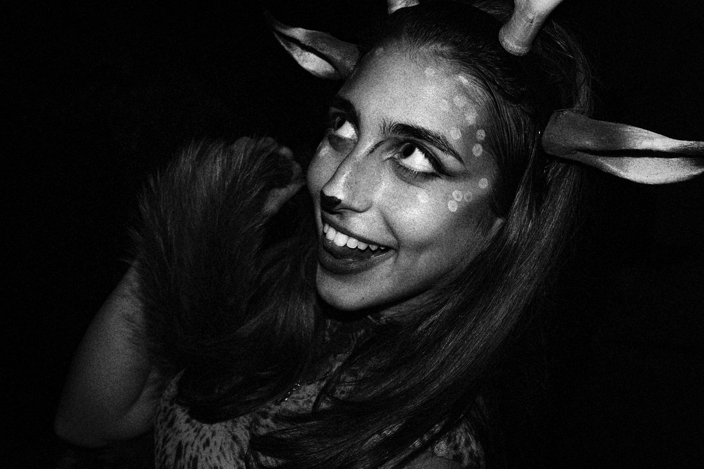 a girl in deer makeup