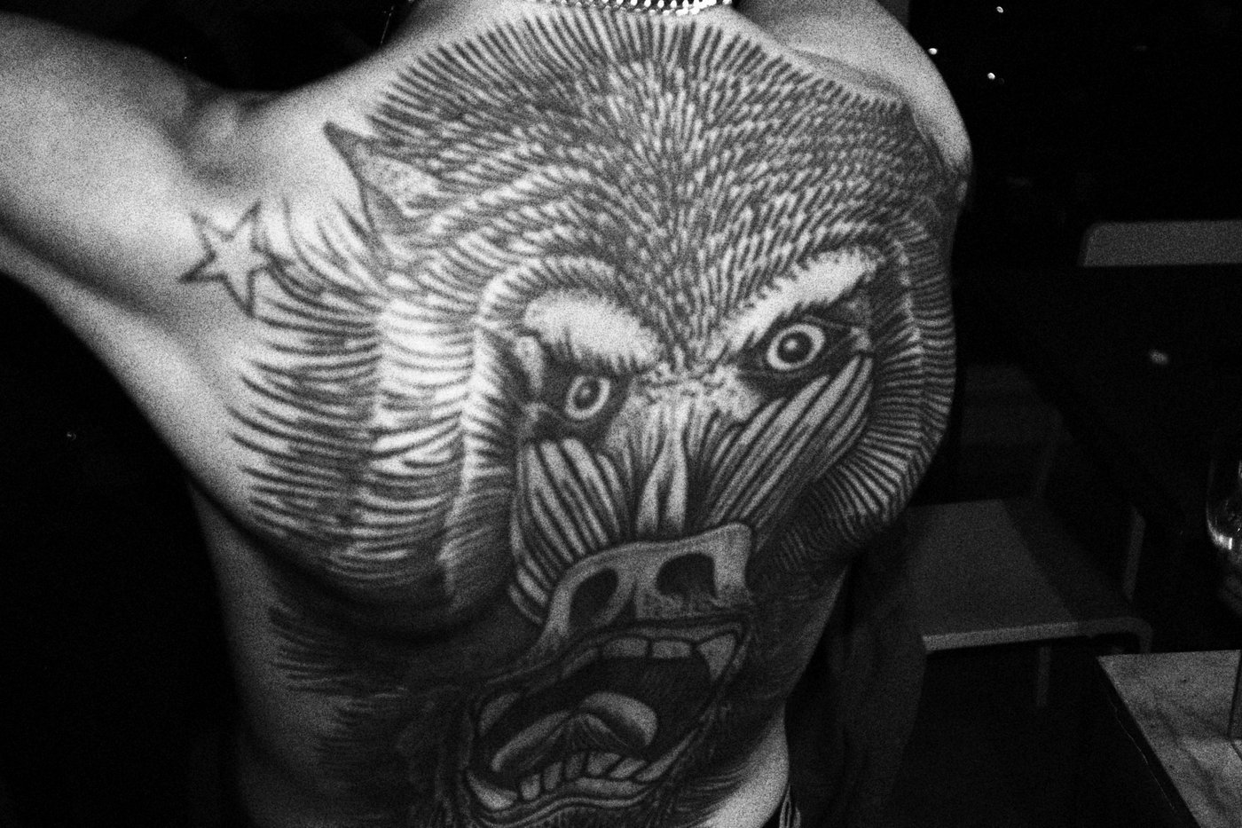 Back tattoo of a monkey