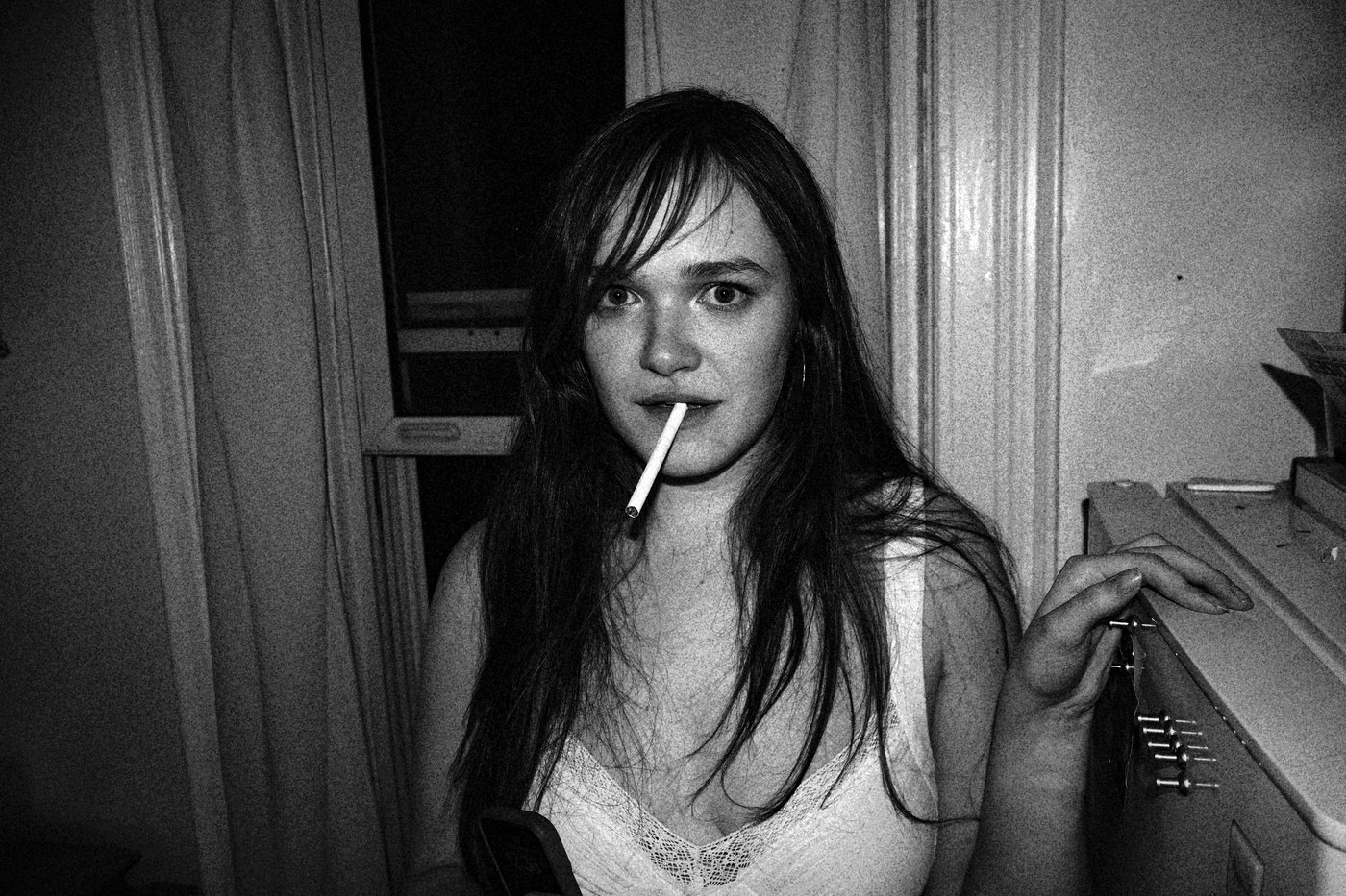 woman smoking inside