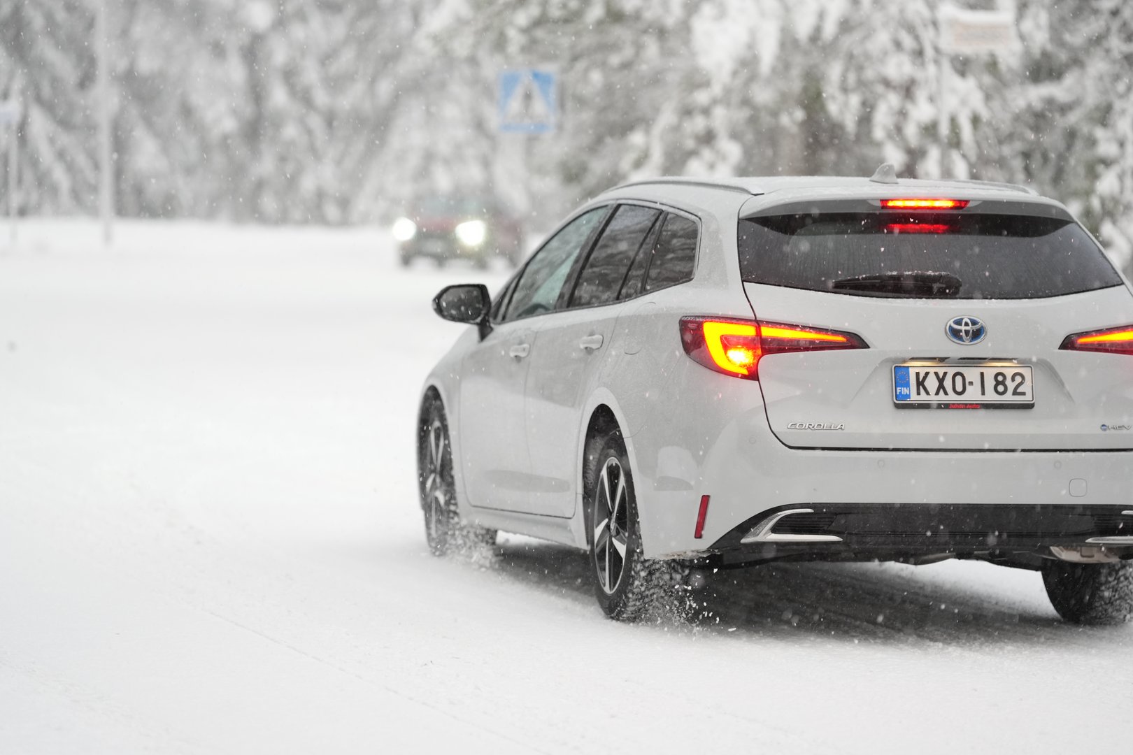 Snow-covered road in Finnish Lapland near Rovaniemi