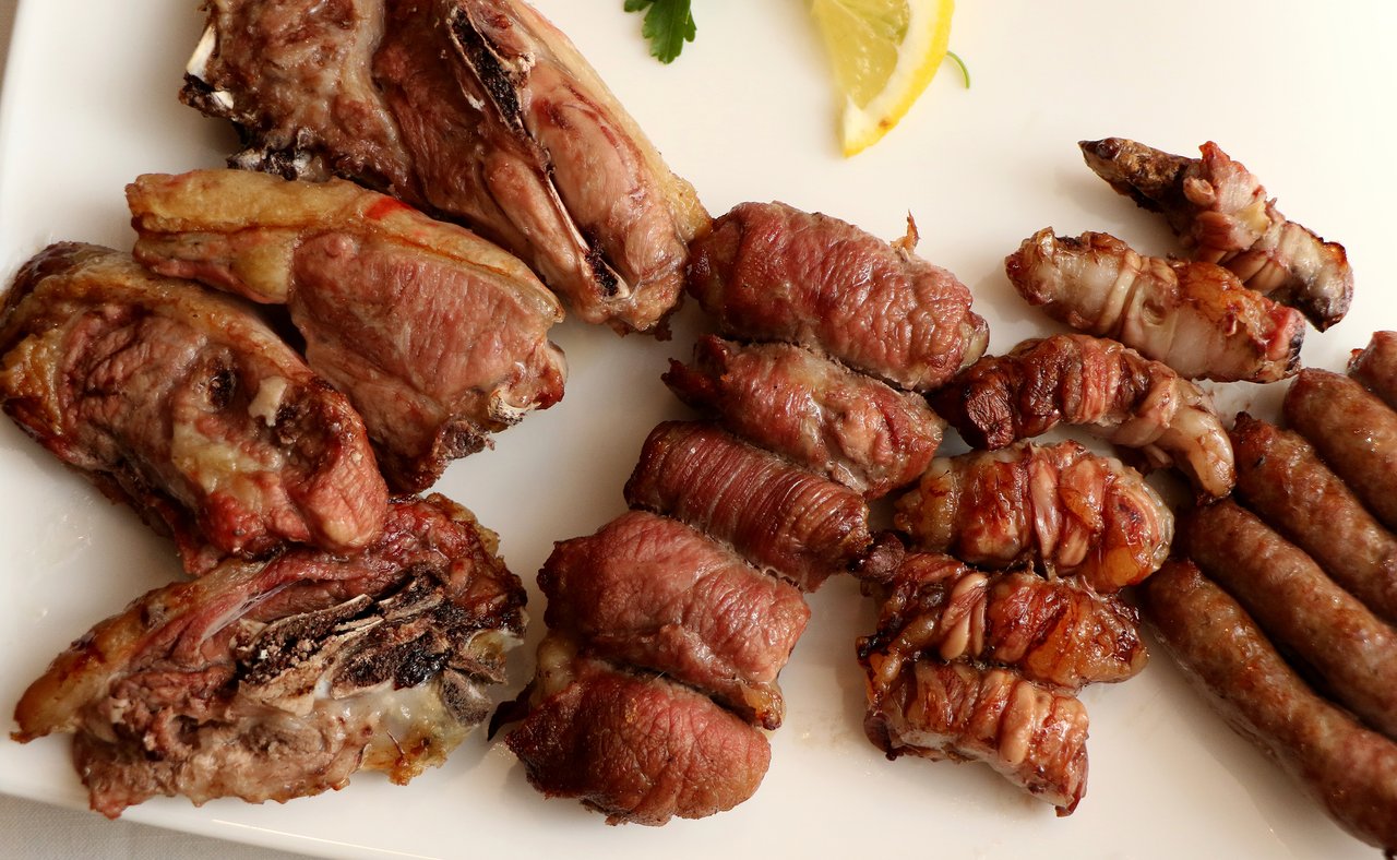Traditional meats from Puglia, Italy served on a platter.