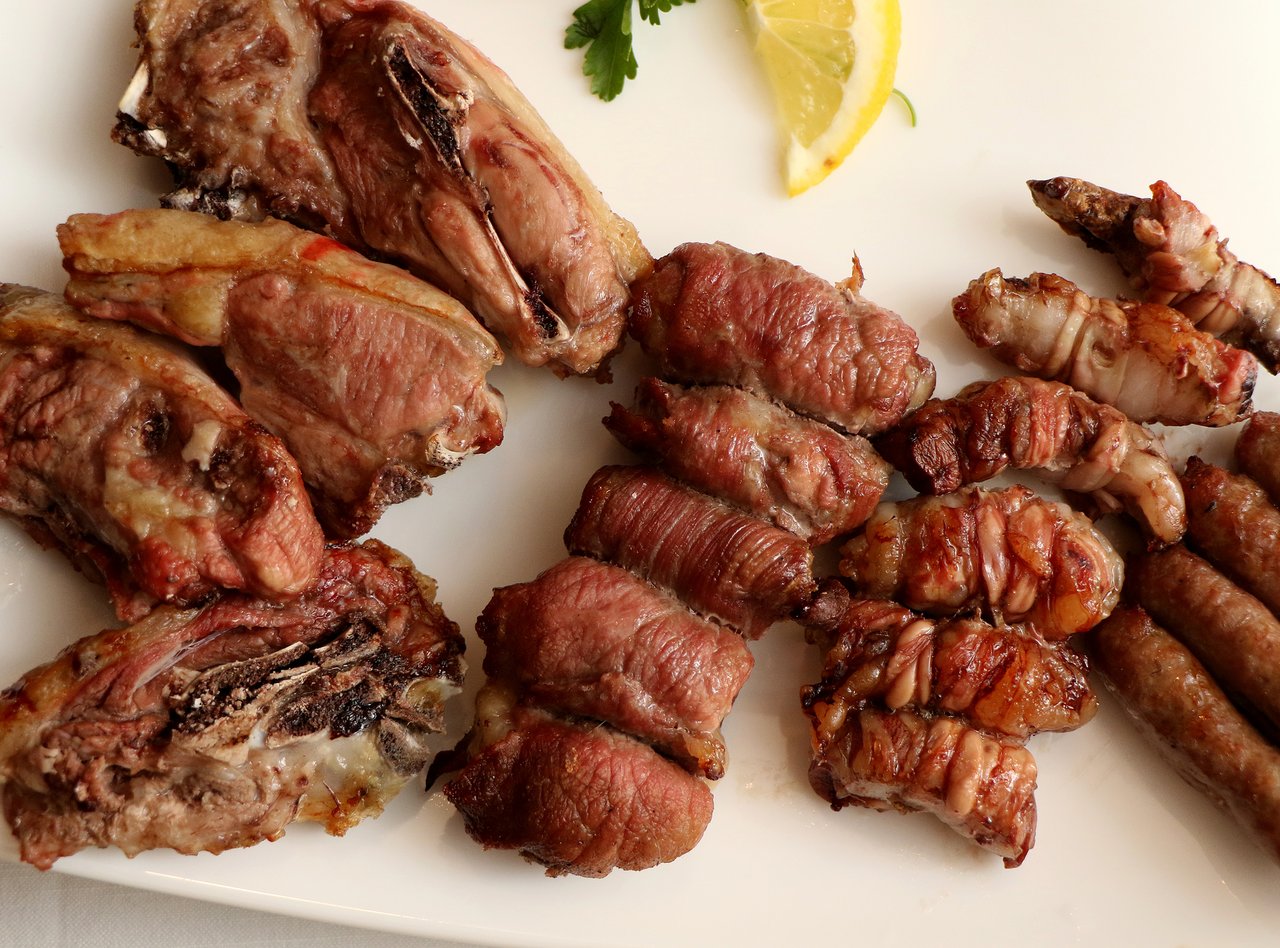 Traditional meats from Puglia, Italy served on a platter.