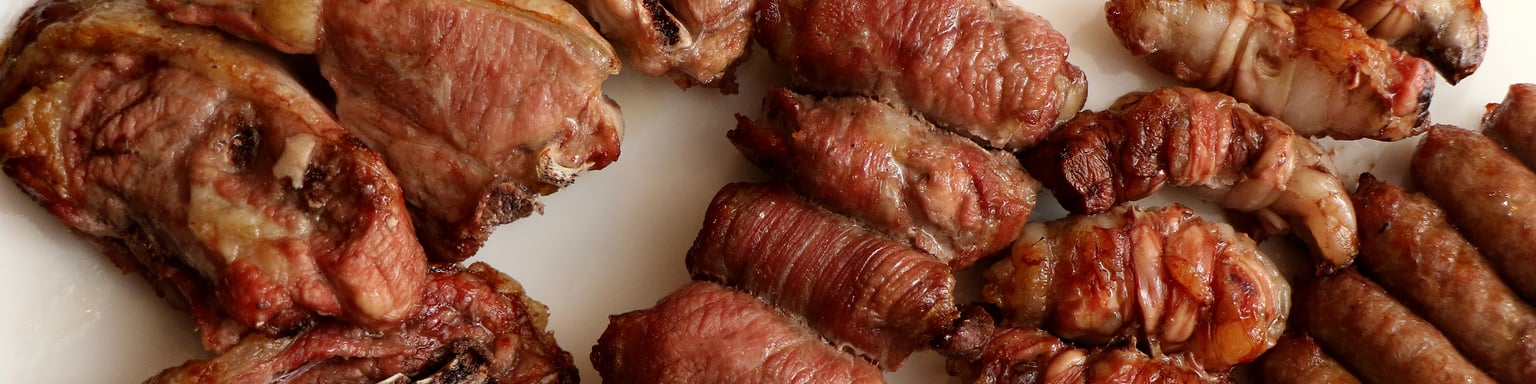 Traditional meats from Puglia, Italy served on a platter.