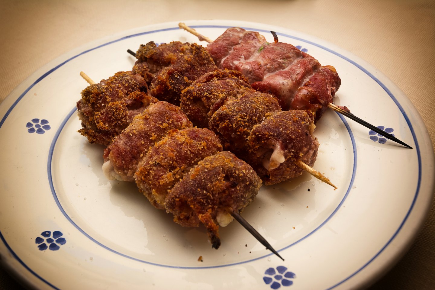 A plate of Bombette, typical Apulian skewers
