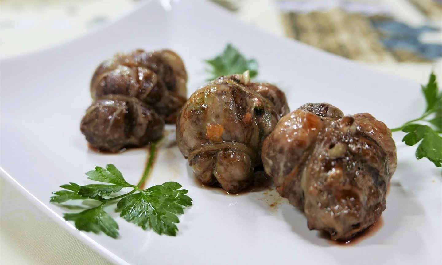 Gnummareddi, lamb's offal rolls, from Puglia, Italy.