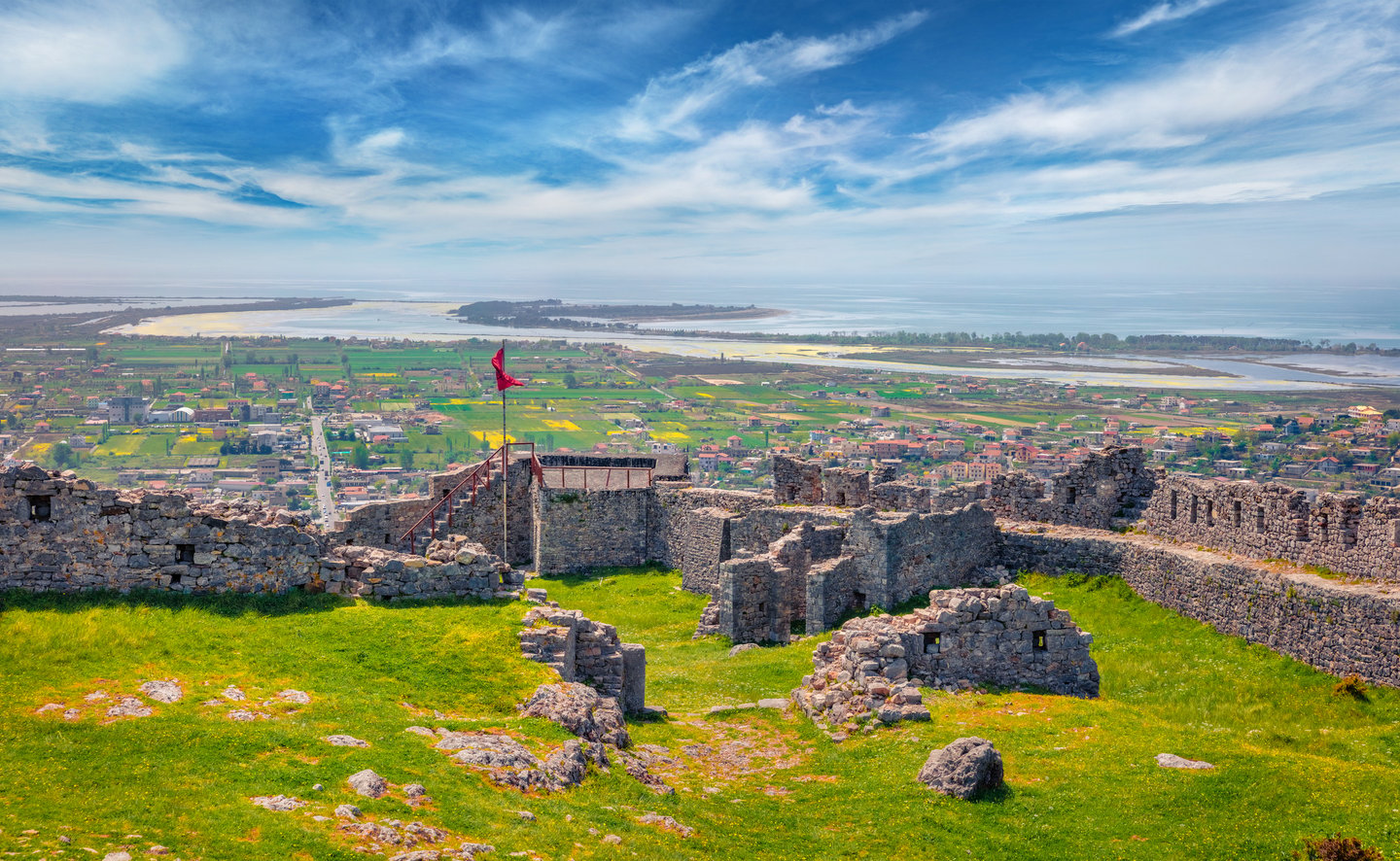 The ruins of Lezhe Fortress and the view of the town on a sunny day.