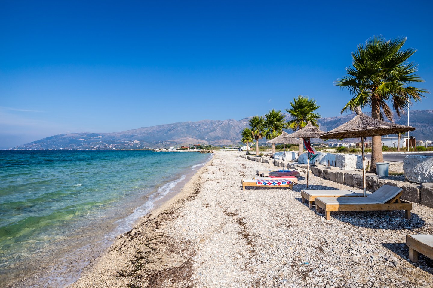 Loungers on Orikum Beach in Vlore, Albania