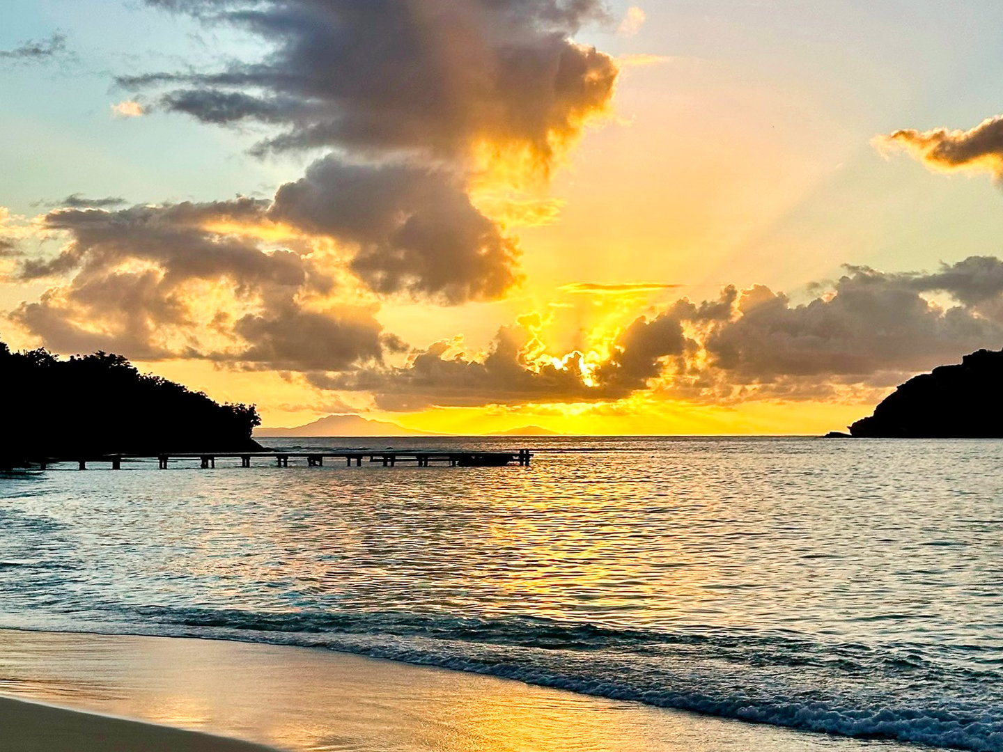 A beautiful sunset on Pigeon Point Beach in Antigua and Barbuda